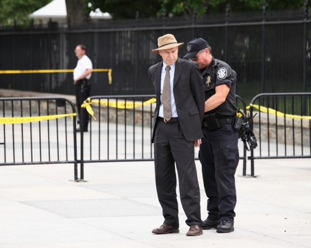 James Hansen getting arrested at an August 2011 protest against the Keystone XL pipeline outside the White House