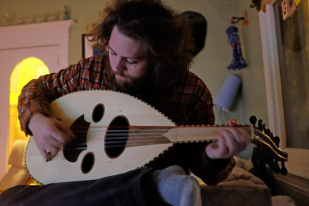 Tristan playing an oud